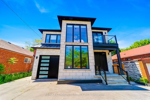 Photo 3 at 856 Kennedy Road, Ionview, Toronto