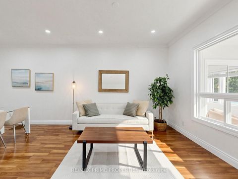 Photo 3 at 18 Dentonia Park Avenue S, Crescent Town, Toronto