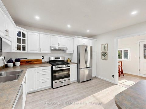 Photo 8 at 18 Dentonia Park Avenue S, Crescent Town, Toronto