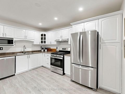 Photo 9 at 18 Dentonia Park Avenue S, Crescent Town, Toronto