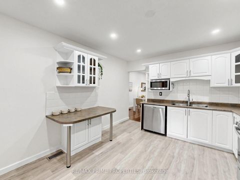 Photo 10 at 18 Dentonia Park Avenue S, Crescent Town, Toronto