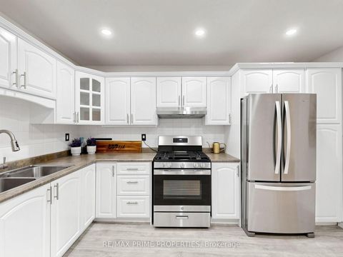 Photo 11 at 18 Dentonia Park Avenue S, Crescent Town, Toronto