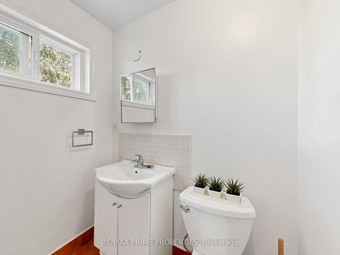 Photo 17 at 18 Dentonia Park Avenue S, Crescent Town, Toronto