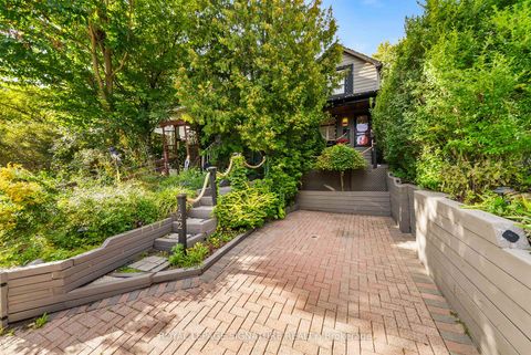 Photo 1 at 122 Duvernet Avenue, Danforth, Toronto