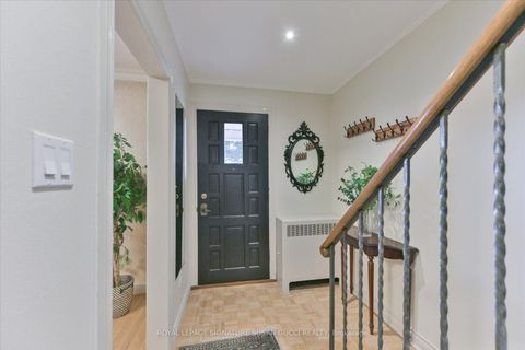 Photo 2 at 8 Sutherland Avenue, Crescent Town, Toronto