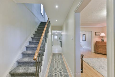 Photo 3 at 8 Sutherland Avenue, Crescent Town, Toronto