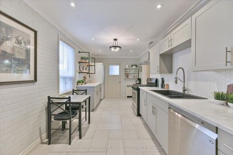 Photo 4 at 8 Sutherland Avenue, Crescent Town, Toronto
