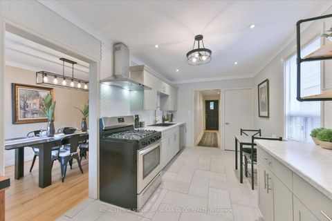 Photo 5 at 8 Sutherland Avenue, Crescent Town, Toronto