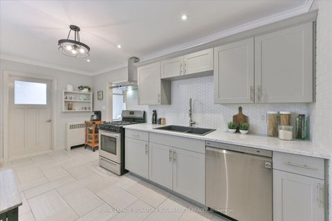 Photo 6 at 8 Sutherland Avenue, Crescent Town, Toronto