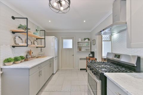 Photo 7 at 8 Sutherland Avenue, Crescent Town, Toronto