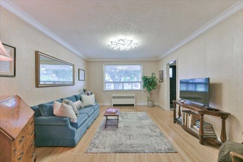 Photo 10 at 8 Sutherland Avenue, Crescent Town, Toronto