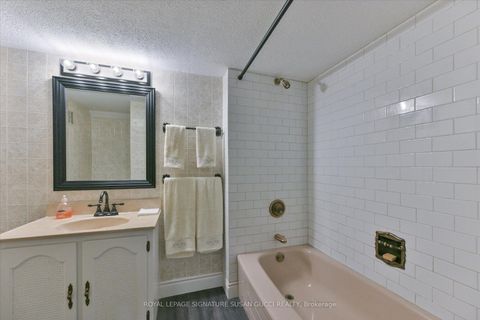 Photo 34 at 8 Sutherland Avenue, Crescent Town, Toronto