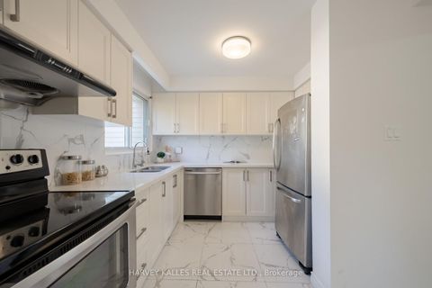Photo 22 at 102 Jenny Wren Way, Hillcrest Village, Toronto