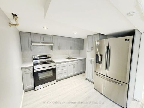 Photo 30 at 61 Bloomington Crescent, Black Creek, Toronto