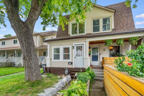 Photo 1 at 5 1/2 Luttrell Avenue, Danforth, Toronto