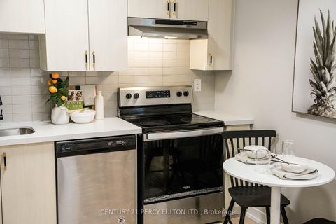 Photo 16 at TH 19 - 70 Orchid Place Drive, Malvern, Toronto