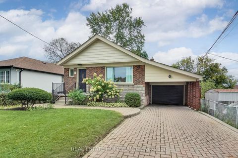 Photo 2 at 1 Bassett Avenue, Birchmount, Toronto