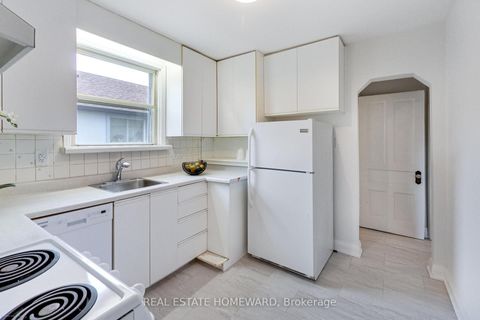 Photo 10 at 1 Bassett Avenue, Birchmount, Toronto