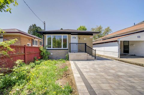Photo 2 at 64 Laurel Avenue, Kennedy Park, Toronto