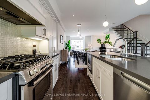 Photo 7 at 18 Matthew Court, Rosethorn, Toronto