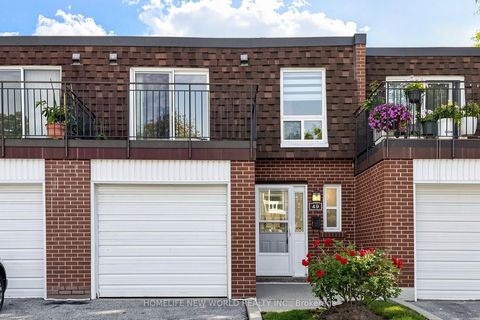 Photo 1 at 49 - 100 Bridletowne Circle, L'Amoreaux, Toronto
