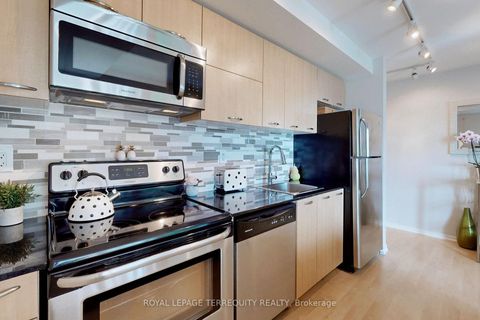 Photo 10 at 710 - 38 Joe Shuster Way, South Parkdale, Toronto