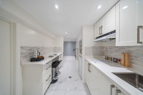 Photo 30 at 2 Four Oaks Gate, East York, Toronto