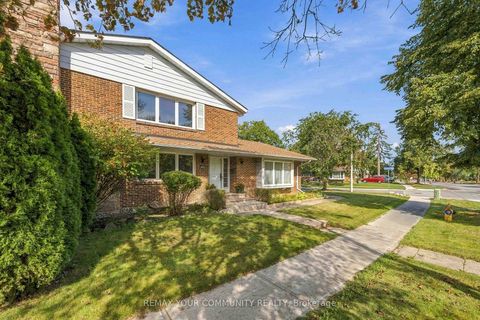 Photo 1 at 588 Huntingwood Drive, L'Amoreaux, Toronto