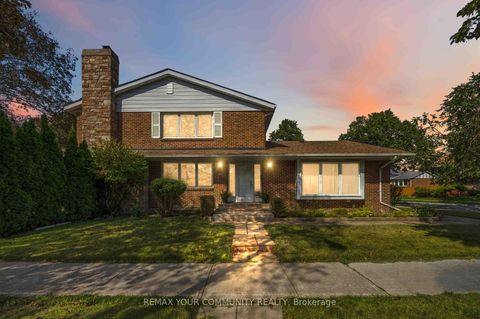 Photo 2 at 588 Huntingwood Drive, L'Amoreaux, Toronto