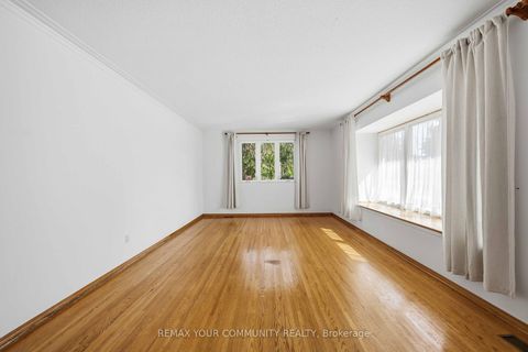 Photo 8 at 588 Huntingwood Drive, L'Amoreaux, Toronto