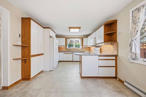 Photo 14 at 588 Huntingwood Drive, L'Amoreaux, Toronto