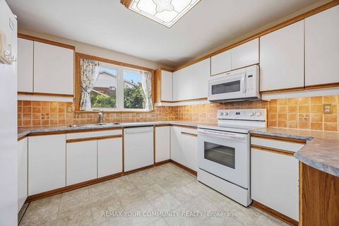Photo 16 at 588 Huntingwood Drive, L'Amoreaux, Toronto