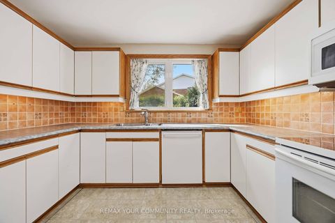 Photo 17 at 588 Huntingwood Drive, L'Amoreaux, Toronto