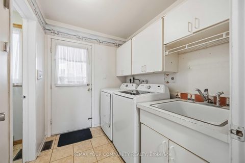 Photo 42 at 588 Huntingwood Drive, L'Amoreaux, Toronto