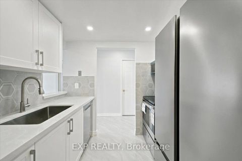Photo 2 at 1927 - 3 Greystone Walk Drive N, Kennedy Park, Toronto