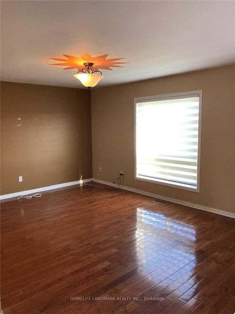 Photo 2 at 139 Raponi Circle, Rouge E11, Toronto