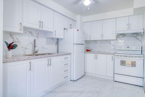 Photo 7 at 18 - 29 Fundy Bay Boulevard, Steeles, Toronto