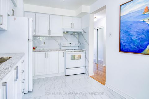 Photo 8 at 18 - 29 Fundy Bay Boulevard, Steeles, Toronto