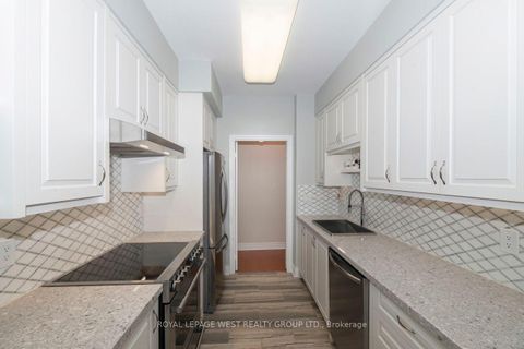 Photo 9 at 302 - 1 Lomond Drive, City Centre West, Toronto