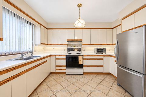 Photo 10 at 30 Cartwright Avenue, Glen Park, Toronto