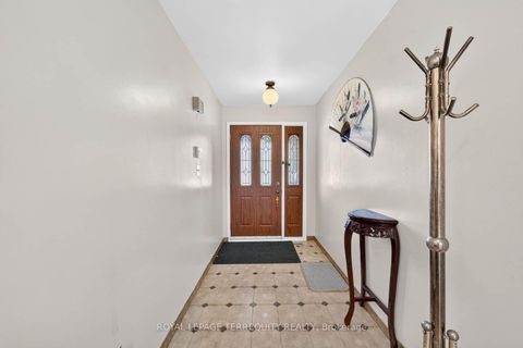 Photo 2 at 851 Huntingwood Drive, Sullivan, Toronto