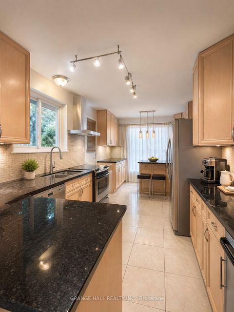 Photo 5 at 210 Lloyd Manor Road, Rosethorn, Toronto