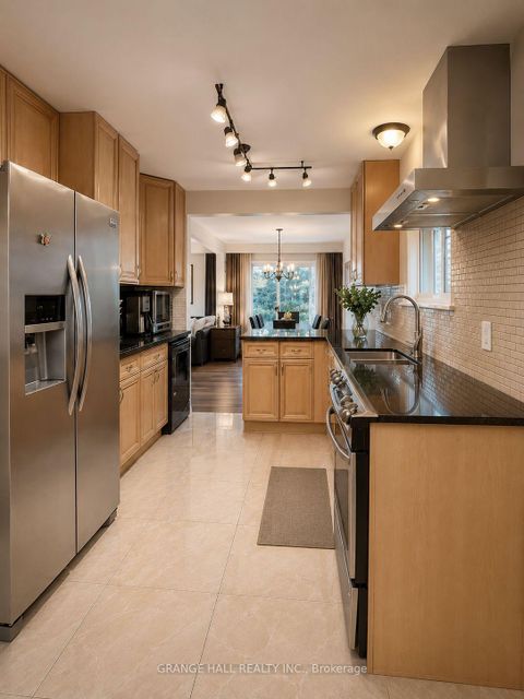 Photo 6 at 210 Lloyd Manor Road, Rosethorn, Toronto