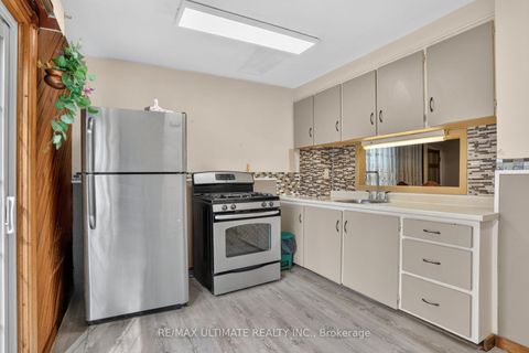 Photo 17 at 12 Eldon Avenue, Crescent Town, Toronto
