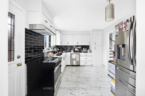 Photo 6 at 99 Amberjack Boulevard, Woburn, Toronto