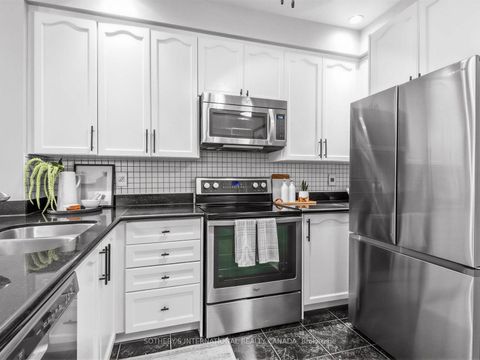 Photo 10 at 127 - 5233 Dundas Street W, City Centre West, Toronto