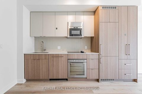 Photo 1 at 414 - 840 St Clair Avenue W, Oakwood Village, Toronto
