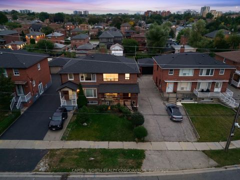 Photo 1 at 65 Falstaff Avenue, Rustic, Toronto