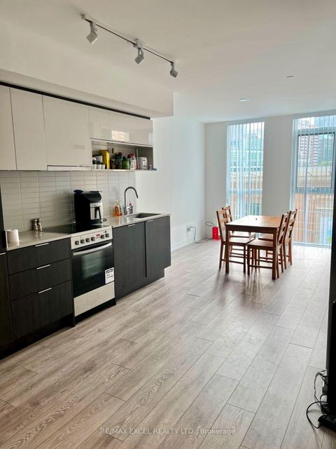 Photo 5 at 406 - 159 Wellesley Street E, South St. James Town, Toronto