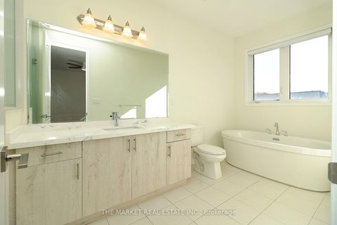 Photo 25 at 13 Father Redmond Way, Alderwood, Toronto